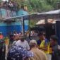 Petugas gabungan melakukan penyedotan air di sisi Jalan Nasional Padang Panjang - Bukit Tinggi, Kabupaten Tanah Datar. (Dok. BPBD Kabupaten Tanah Datar)